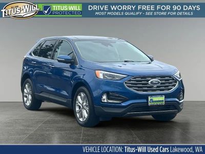 2024 Ford Edge Titanium in Blue Metallic — front three-quarter view