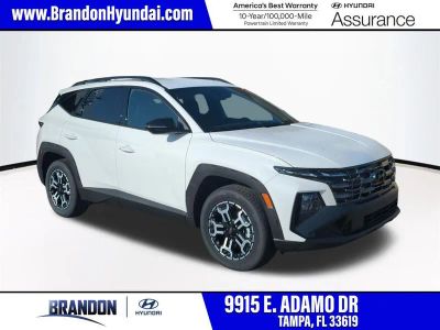 2026 Hyundai TUCSON XRT in White — front three-quarter view