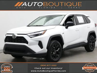 2023 Toyota RAV4 LE in White — front three-quarter view