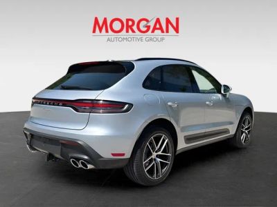 2026 Porsche Macan — rear three-quarter view