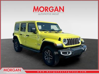 2024 Jeep Wrangler Sahara in Yellow — front three-quarter view