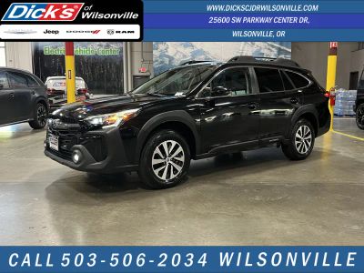 2023 Subaru Outback Premium in Crystal Black Silica — front three-quarter view