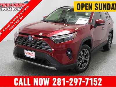 2024 Toyota RAV4 AWD Hybrid Limited 2.5L in Ruby Flare Pearl — front three-quarter view