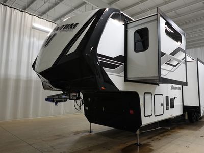 2026 Grand Design Momentum M Class — rear three-quarter view