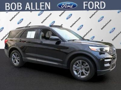2024 Ford Explorer XLT in Agate Black Metallic — front three-quarter view