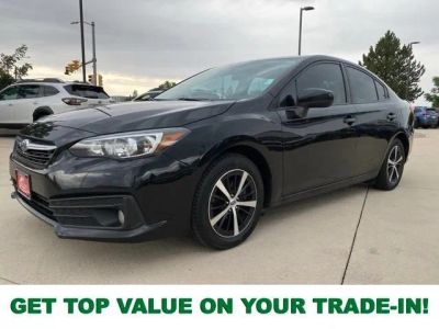 2021 Subaru Impreza Premium in Crystal Black Silica — front three-quarter view