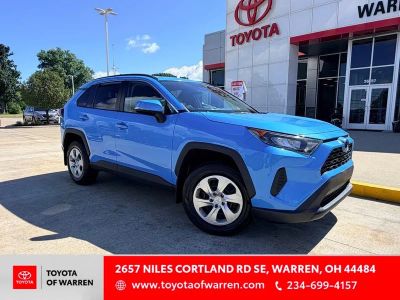 2019 Toyota RAV4 LE in Blue Flame — front three-quarter view
