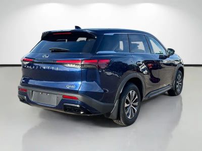 2023 INFINITI QX60 — rear three-quarter view