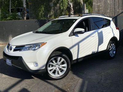 2014 Toyota RAV4 Limited in Wht/White — front three-quarter view