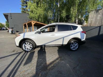 2014 Toyota RAV4 — rear three-quarter view