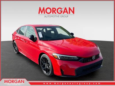 2026 Honda Civic Sedan Sport in Rallye Red — front three-quarter view