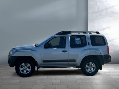 2013 Nissan Xterra — rear three-quarter view