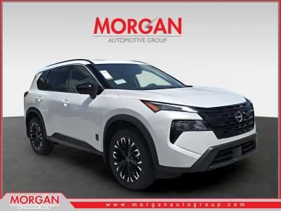 2026 Nissan Rogue Dark Armor in White — front three-quarter view