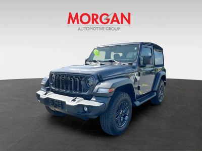 2024 Jeep Wrangler — rear three-quarter view