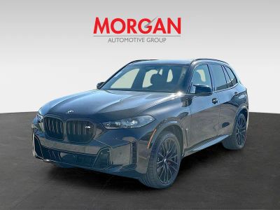 2026 BMW X5 — rear three-quarter view