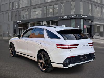 2023 Genesis GV70 — rear three-quarter view