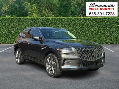 2024 Genesis GV80 3.5T AWD in Makalu Gray — front three-quarter view