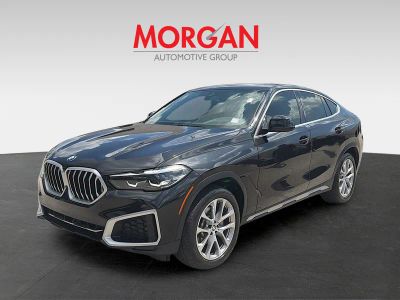2022 BMW X6 — rear three-quarter view