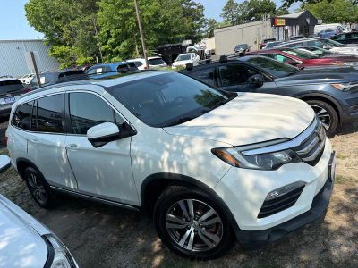 2017 Honda Pilot — rear three-quarter view