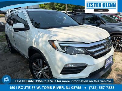 2017 Honda Pilot EX-L in White Diamond Pearl — front three-quarter view