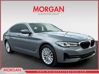 2023 BMW 5 Series 530i in Skyscraper Gray Metallic — front three-quarter view