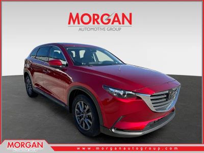 2023 Mazda CX-9 Touring in Soul Red Crystal Metallic — front three-quarter view