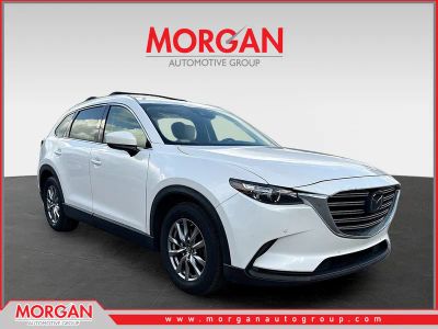 2018 Mazda CX-9 Touring in Snowflake White Pearl — front three-quarter view