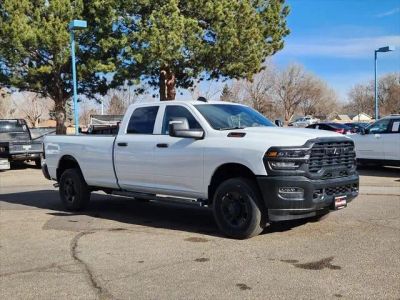 2026 RAM 2500 RAM 2500 TRADESMAN CREW CAB 4X4 8' BOX in Bright White Clear-Coat Exterior Paint — front three-quarter view