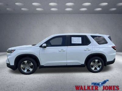 2023 Honda Pilot EX-L 8 Passenger in Platinum White Pearl — front three-quarter view