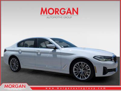 2023 BMW 5 Series 540i in White — front three-quarter view