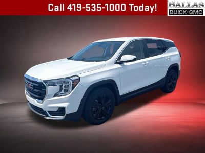 2024 GMC Terrain SLE in Summit White — front three-quarter view