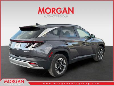 2025 Hyundai Tucson Hybrid — rear three-quarter view