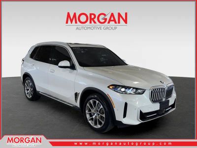 2026 BMW X5 xDrive40i in White — front three-quarter view