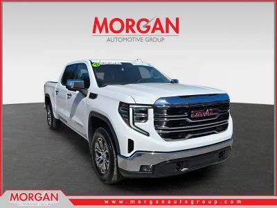 2025 GMC Sierra 1500 SLT in Summit White — front three-quarter view