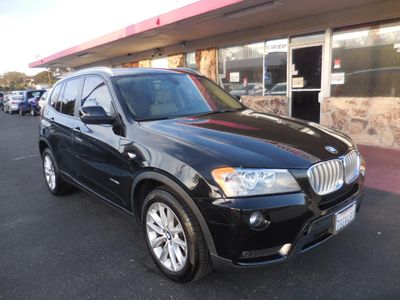2014 BMW X3 in Black — front three-quarter view