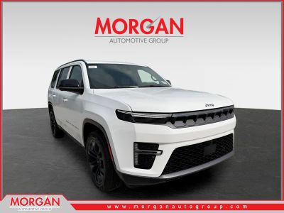 2026 Jeep Grand Wagoneer Summit Obsidian in Bright White Clearcoat — front three-quarter view