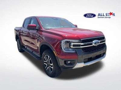 2026 Ford Ranger Lariat in Ruby Red Metallic Tinted Clearcoat — front three-quarter view