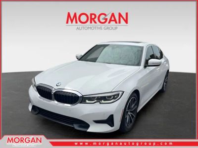 2021 BMW 3 Series 330i in White — front three-quarter view