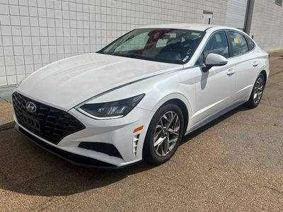 2021 Hyundai Sonata SEL in Quartz White — front three-quarter view