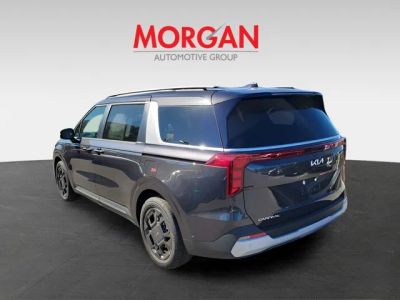 2026 Kia Carnival Hybrid — rear three-quarter view