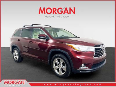 2015 Toyota Highlander Limited in Red — front three-quarter view