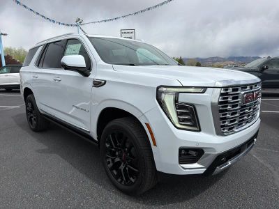 2026 GMC Yukon Denali in Glacier White Tricoat — front three-quarter view