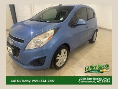 2015 Chevrolet Spark LS in Metallic Paint.) — front three-quarter view
