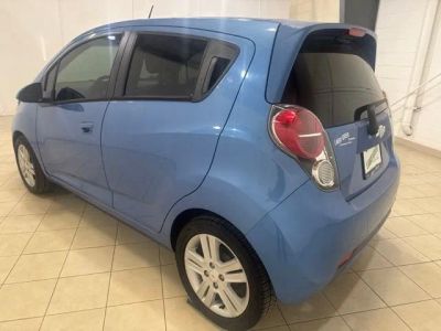 2015 Chevrolet Spark — rear three-quarter view