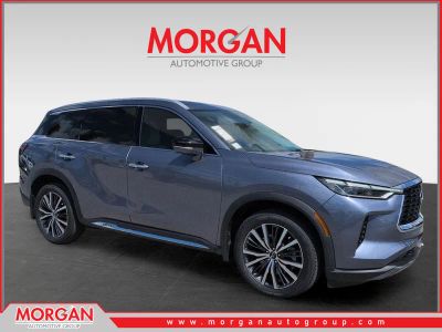 2023 INFINITI QX60 Sensory in Blue — front three-quarter view