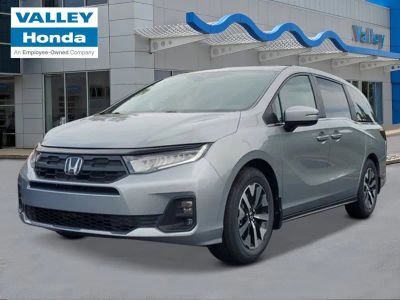 2026 Honda Odyssey EX-L in Solar Silver Metallic — front three-quarter view