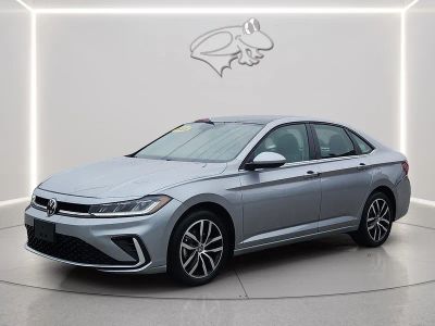 2025 Volkswagen Jetta SE in Deep Black Pearl — front three-quarter view