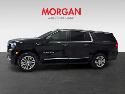 2024 GMC Yukon XL — rear three-quarter view