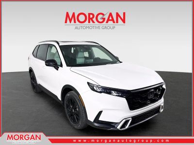 2026 Honda CR-V Hybrid Sport Touring in Platinum White Pearl — front three-quarter view
