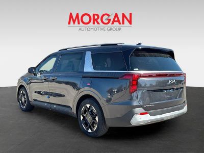 2026 Kia Carnival — rear three-quarter view